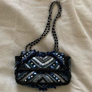 Mirror and Pom Pom Bag